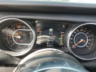 2019 Jeep Wrangler Unlimited Sahara with VIN 1C4HJXENXKW521630, listed as a Copart auction lot 56196145 with 56,753 mi miles and Salvage title. Bid and sale history available at DreamBid. Image 9.