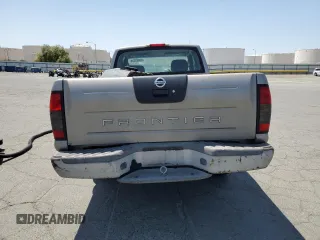 2004 Nissan Frontier XE with VIN 1N6DD26TX4C447116, listed as a Copart auction lot 59432335 with 127,001 mi miles and Salvage title. Bid and sale history available at DreamBid. Image 6.