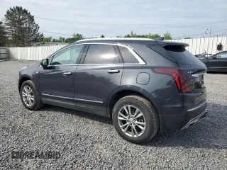 2022 Cadillac XT5 AWD Premium Luxury with VIN 1GYKNDRS9NZ126988, listed as a Copart auction lot 61019965 with 30,189 mi miles and Salvage title. Bid and sale history available at DreamBid. Image 2.