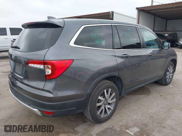2020 Honda Pilot EX-L z VIN 5FNYF5H5XLB016632, wystawiony jako IAAI lot #41968994 z przebiegiem 75 540 mil mil oraz . Historia ofert i sprzedaży dostępna na DreamBid. Obrazek 4.
