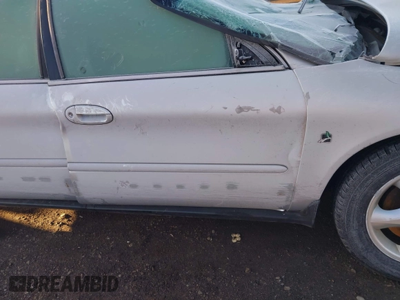 2001 Ford Taurus SE Standard z VIN 1FAFP582X1G268769, wystawiony jako IAAI lot #41837093 z przebiegiem 42 261 mil mil oraz . Historia ofert i sprzedaży dostępna na DreamBid. Obrazek 18.