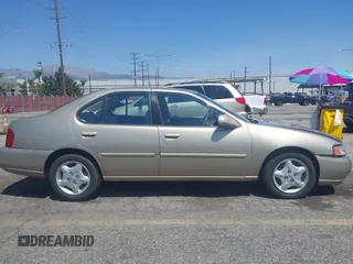 2000 Nissan Altima XE with VIN 1N4DL01D3YC197921, listed as a IAAI auction lot 41953585 with 84,233 mi miles. Bid and sale history available at carsss.com. Image 13.