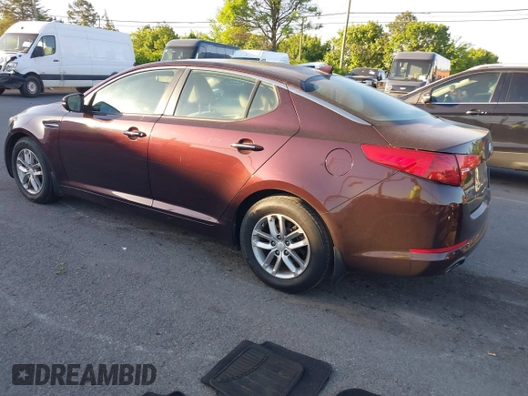 2013 Kia Optima LX with VIN 5XXGM4A71DG124725, listed as a IAAI auction lot 42041768 with 184,181 mi miles and . Bid and sale history available at carsss.com. Image 3.