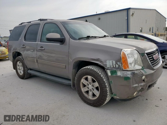 2011 GMC Yukon SLT z VIN 1GKS1CE01BR359134, wystawiony jako Copart lot #53693295 z przebiegiem 95 060 mil mil oraz Szkoda całkowita • Salvage title. Historia ofert i sprzedaży dostępna na DreamBid. Obrazek 4.