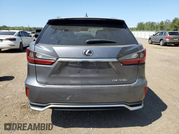 2021 Lexus RX with VIN JTJHZKFA1M2031902, listed as a Copart auction lot 67645974 with 72,192 mi miles and Salvage Title. Bid and sale history available at carsss.com. Image 6.