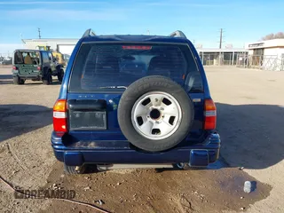 2003 Suzuki Vitara z VIN 2S3TE52V436101091, wystawiony jako IAAI lot #41472279 z przebiegiem 163 429 mil mil oraz . Historia ofert i sprzedaży dostępna na DreamBid. Obrazek 16.