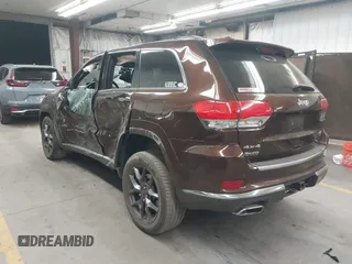 2014 Jeep Grand Cherokee Summit with VIN 1C4RJFJT6EC346575, listed as a IAAI auction lot 41881795 with 148,941 mi miles and . Bid and sale history available at DreamBid. Image 3.