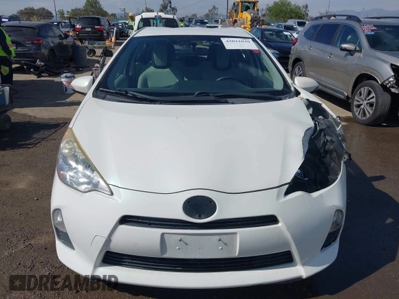 2014 Toyota Prius One with VIN JTDKDTB35E1561818, listed as a IAAI auction lot 42021039 with 184,584 mi miles and . Bid and sale history available at DreamBid. Image 12.