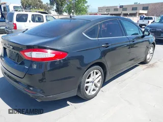 2013 Ford Fusion SE with VIN 3FA6P0H76DR312052, listed as a IAAI auction lot 42088821 with 135,761 mi miles. Bid and sale history available at carsss.com. Image 4.