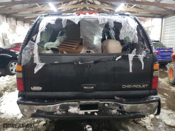 2004 Chevrolet Suburban LT with VIN 1GNFK16Z24J165975, listed as a Copart auction lot 79915414 with 302,930 mi miles and Salvage Title. Bid and sale history available at carsss.com. Image 6.