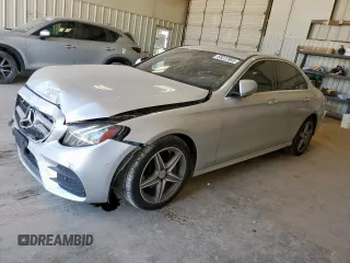 2017 Mercedes-Benz E 300 Luxury with VIN WDDZF4JB2HA031453, listed as a Copart auction lot 58222955 with 136,857 mi miles and Salvage title. Bid and sale history available at DreamBid. Image 1.