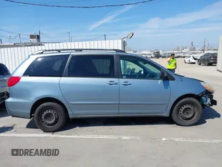 2010 Toyota Sienna CE with VIN 5TDKK4CCXAS332266, listed as a IAAI auction lot 41809577 with 217,051 mi miles. Bid and sale history available at carsss.com. Image 14.