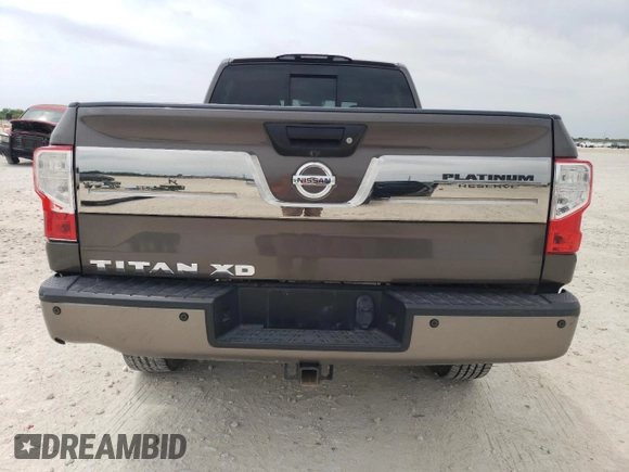 2016 Nissan Titan Platinum Reserve z VIN 1N6BA1F27GN507136, wystawiony jako Copart lot #53681615 z przebiegiem 155 101 mil mil oraz Czysty tytuł • Clean title. Historia ofert i sprzedaży dostępna na DreamBid. Obrazek 6.