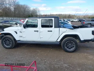 2020 Jeep Gladiator Overland with VIN 1C6HJTFG1LL107641, listed as a IAAI auction lot 41847586 with 69,664 mi miles and . Bid and sale history available at DreamBid. Image 14.