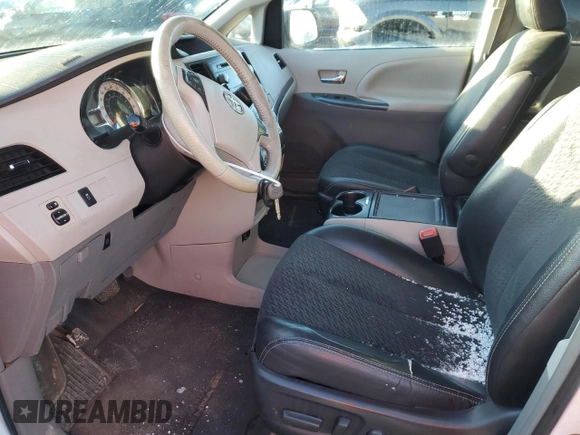 2012 Toyota Sienna SE with VIN 5TDXK3DC5CS214658, listed as a Copart auction lot 49622925 with 120,693 mi miles and Salvage title. Bid and sale history available at DreamBid. Image 7.