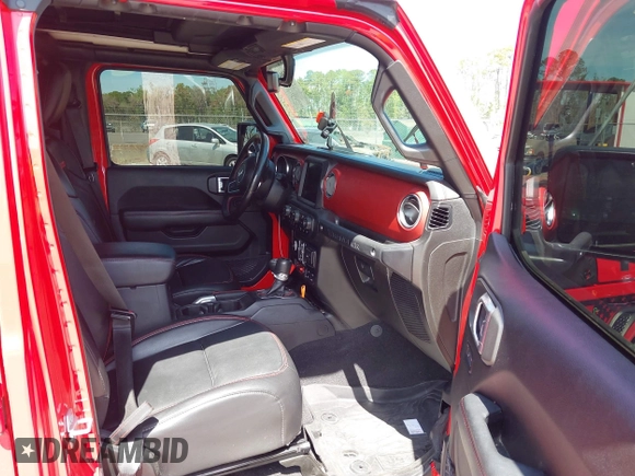 2020 Jeep Wrangler Unlimited Rubicon with VIN 1C4HJXFG9LW106607, listed as a IAAI auction lot 41908295 with 71,083 mi miles and . Bid and sale history available at DreamBid. Image 5.