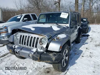 2018 Jeep Wrangler JK Unlimited Sahara with VIN 1C4HJWEG9JL801714, listed as a IAAI auction lot 41591307 with 79,201 mi miles. Bid and sale history available at carsss.com. Image 2.