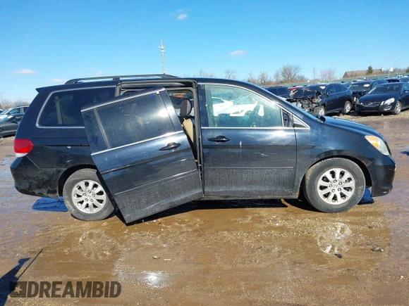 2008 Honda Odyssey EX-L z VIN 5FNRL38758B066638, wystawiony jako IAAI lot #41664349 z przebiegiem 134 194 mil mil oraz . Historia ofert i sprzedaży dostępna na DreamBid. Obrazek 13.