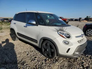 2014 FIAT 500L Trekking with VIN ZFBCFADH6EZ011642, listed as a Copart auction lot 71474774 with 104,327 mi miles and Salvage Title. Bid and sale history available at carsss.com. Image 4.