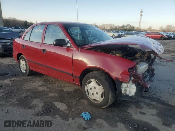 1997 Hyundai Accent z VIN KMHVF24N9VU356190, wystawiony jako Copart lot #85610774 z przebiegiem 91 707 mil mil oraz Tytuł czysty. Historia ofert i sprzedaży dostępna na DreamBid. Obrazek 4.