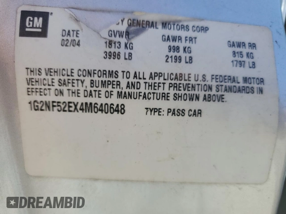 2004 Pontiac Grand Am SE1 with VIN 1G2NF52EX4M640648, listed as a Copart auction lot 48903945 with 303,027 mi miles and Salvage title. Bid and sale history available at DreamBid. Image 12.