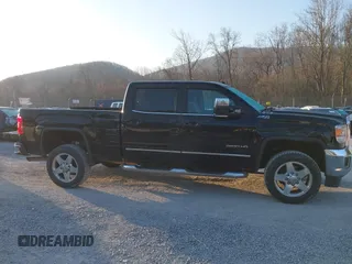 2015 GMC Sierra 2500HD available WiFi SLT with VIN 1GT12ZEG7FF606328, listed as a IAAI auction lot 41793799 with 94,107 mi miles. Bid and sale history available at carsss.com. Image 13.