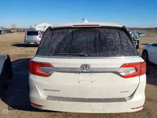 2018 Honda Odyssey Elite with VIN 5FNRL6H97JB039191, listed as a IAAI auction lot 41625687 with 54,363 mi miles and . Bid and sale history available at DreamBid. Image 16.