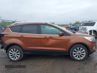 2017 Ford Escape Titanium with VIN 1FMCU0JD3HUB20846, listed as a IAAI auction lot 42182260 with 28,610 mi miles and . Bid and sale history available at DreamBid. Image 14.