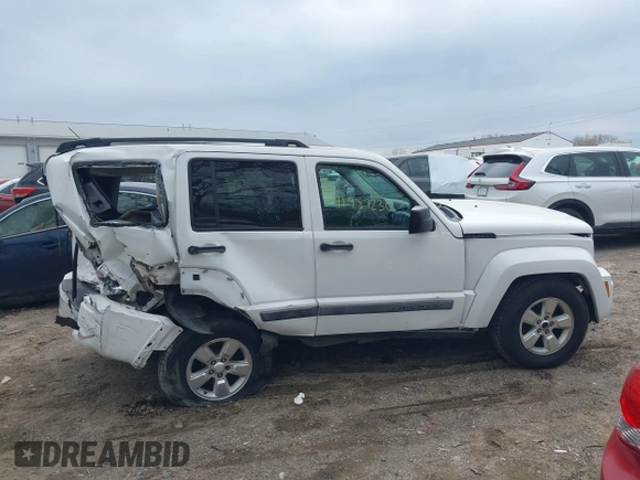 2012 Jeep Liberty Sport with VIN 1C4PJMAKXCW100451, listed as a IAAI auction lot 41987230 with 83,904 mi miles and . Bid and sale history available at DreamBid. Image 14.