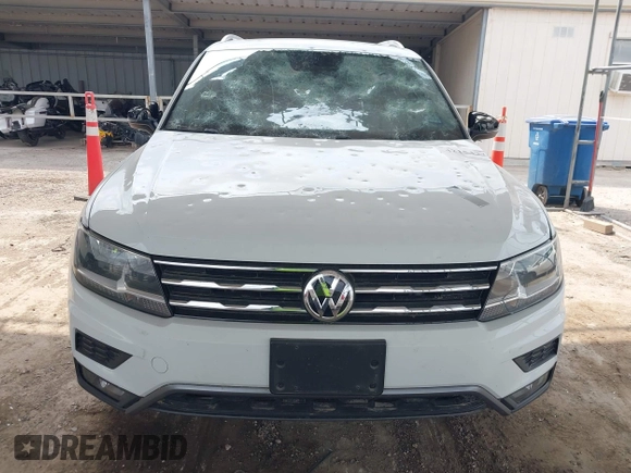 2018 Volkswagen Tiguan SEL with VIN 3VV2B7AX8JM120443, listed as a IAAI auction lot 42154773 with 70,256 mi miles and . Bid and sale history available at DreamBid. Image 12.