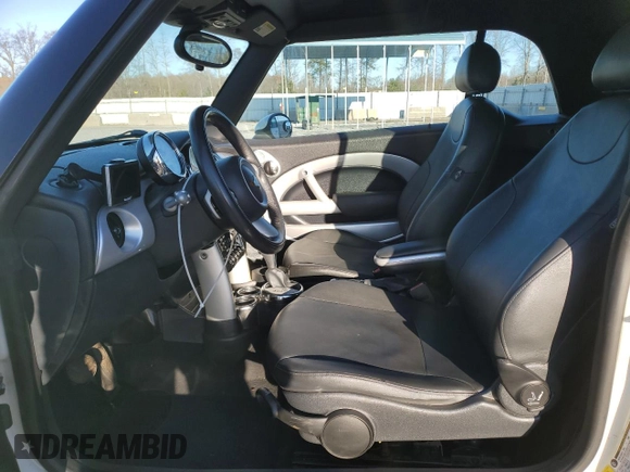 2008 MINI Convertible with VIN WMWRF33588TG18353, listed as a Copart auction lot 49401615 with 124,540 mi miles and Salvage Title. Bid and sale history available at DreamBid. Image 7.
