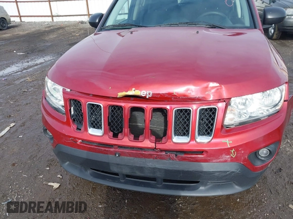 2013 Jeep Compass Sport with VIN 1C4NJDBB2DD207609, listed as a IAAI auction lot 41653746 with 121,697 mi miles. Bid and sale history available at carsss.com. Image 6.