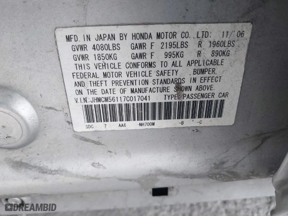 2007 Honda Accord Sdn VP with VIN JHMCM56117C017041, listed as a IAAI auction lot 42033947 with 231,586 mi miles. Bid and sale history available at carsss.com. Image 9.