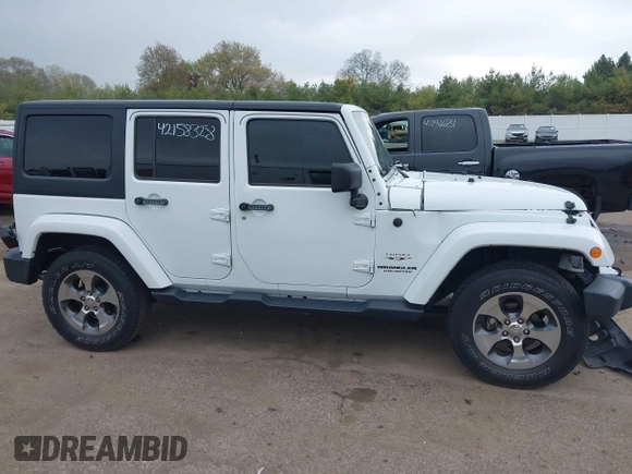 2016 Jeep Wrangler Unlimited Sahara с VIN 1C4HJWEG8GL345391, выставлен на аукционе IAAI как лот 42158328 с пробегом 61 020 миль миль и . История ставок и продаж доступна на DreamBid. Изображение 13.