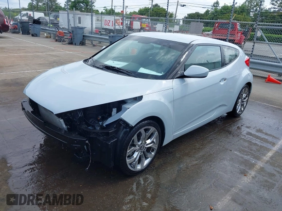 2015 Hyundai Veloster z VIN KMHTC6AD8FU222744, wystawiony jako IAAI lot #42129397 z przebiegiem Nie podano mil oraz . Historia ofert i sprzedaży dostępna na DreamBid. Obrazek 17.