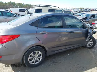 2014 Hyundai Accent GLS with VIN KMHCT4AEXEU710606, listed as a IAAI auction lot 41764163 with 103,859 mi miles. Bid and sale history available at carsss.com. Image 13.