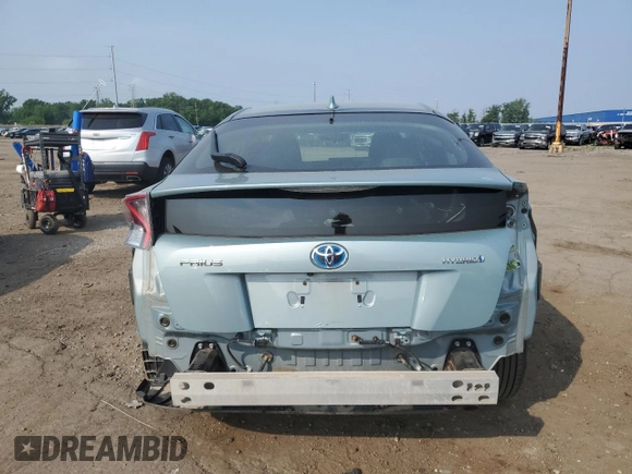 2016 Toyota Prius Four z VIN JTDKARFU6G3502881, wystawiony jako Copart lot #59376895 z przebiegiem 123 863 mil mil oraz Czysty tytuł • Clean title. Historia ofert i sprzedaży dostępna na DreamBid. Obrazek 6.