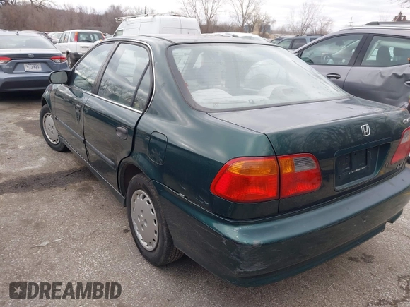 2000 Honda Civic LX with VIN 1HGEJ6673YL069805, listed as a IAAI auction lot 41511192 with 80,097 mi miles. Bid and sale history available at carsss.com. Image 3.