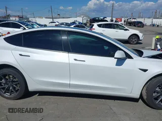 2023 Tesla Model 3 z VIN 5YJ3E1EA2PF514871, wystawiony jako IAAI lot #41703073 z przebiegiem 21 227 mil mil oraz . Historia ofert i sprzedaży dostępna na DreamBid. Obrazek 13.
