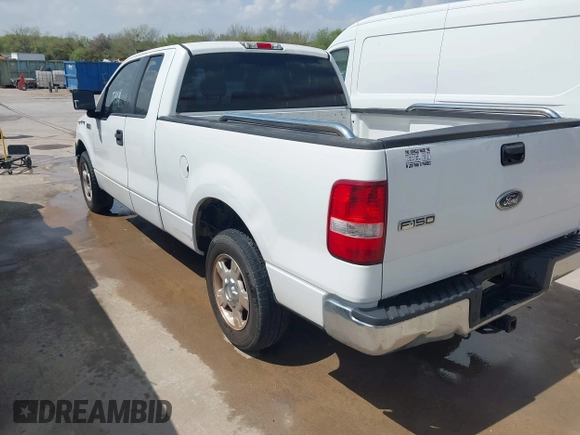 2005 Ford F-150 STX with VIN 1FTRX12W85NB75651, listed as a IAAI auction lot 41789580 with 235,133 mi miles. Bid and sale history available at carsss.com. Image 3.