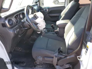 2021 Jeep Wrangler Sport S with VIN 1C4GJXANXMW751236, listed as a Copart auction lot 50683115 with 56,325 mi miles and Salvage Title. Bid and sale history available at DreamBid. Image 7.