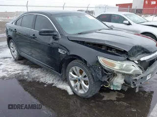 2011 Ford Taurus SEL with VIN 1FAHP2EW1BG114726, listed as a IAAI auction lot 41689674 with 312,338 mi miles. Bid and sale history available at carsss.com. Image 1.
