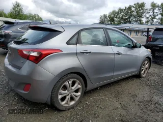 2013 Hyundai Elantra z VIN KMHD35LE3DU075234, wystawiony jako Copart lot #57754185 z przebiegiem 107 040 mil mil oraz Szkoda całkowita • Salvage title. Historia ofert i sprzedaży dostępna na DreamBid. Obrazek 3.