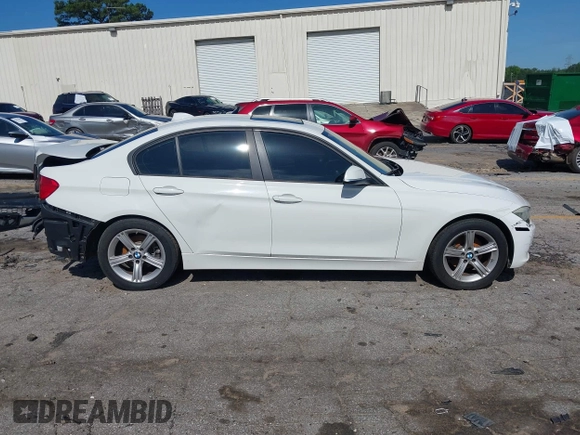2014 BMW 3 Series 328i with VIN WBA3A5C58EP602669, listed as a IAAI auction lot 42514389 with 187,330 mi miles and . Bid and sale history available at DreamBid. Image 14.