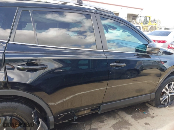 2018 Toyota RAV4 LE with VIN 2T3ZFREV9JW457062, listed as a IAAI auction lot 41696609 with 96,716 mi miles. Bid and sale history available at carsss.com. Image 13.
