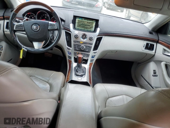 2009 Cadillac CTS AWD w/1SA with VIN 1G6DH577590123416, listed as a Copart auction lot 48297495 with 142,728 mi miles and Salvage Title. Bid and sale history available at carsss.com. Image 8.