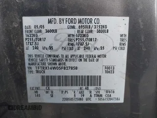 2005 Ford F-150 STX with VIN 1FTRX14W05FB27858, listed as a IAAI auction lot 41300421 with 225,035 mi miles. Bid and sale history available at carsss.com. Image 9.