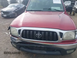 2004 Toyota Tacoma z VIN 5TEWN72N04Z445695, wystawiony jako IAAI lot #41993156 z przebiegiem 150 087 mil mil oraz . Historia ofert i sprzedaży dostępna na DreamBid. Obrazek 12.