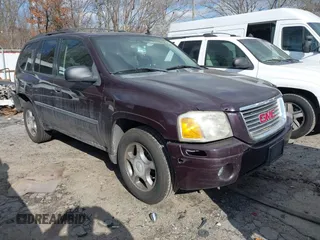 2008 GMC Envoy SLE2 with VIN 1GKDT13S482111358, listed as a IAAI auction lot 41415441 with 244,325 mi miles. Bid and sale history available at carsss.com. Image 1.