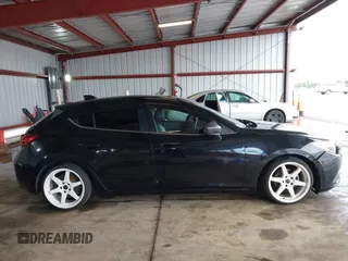 2014 Mazda 3 i Grand Touring with VIN JM1BM1M78E1163314, listed as a IAAI auction lot 41578305 with 159,434 mi miles and . Bid and sale history available at DreamBid. Image 13.